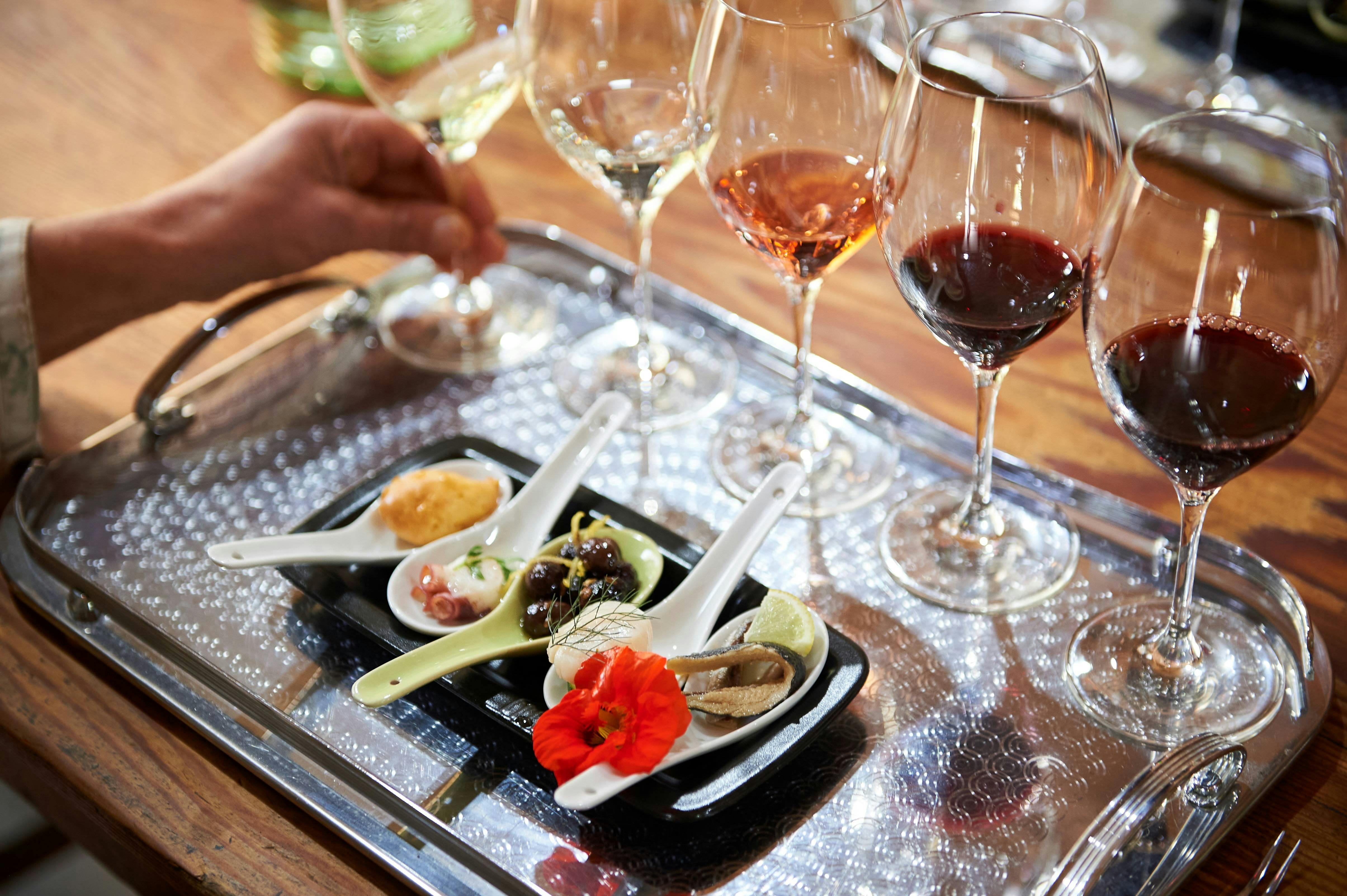 Close up of a wine flight-5 wines paired to local produce