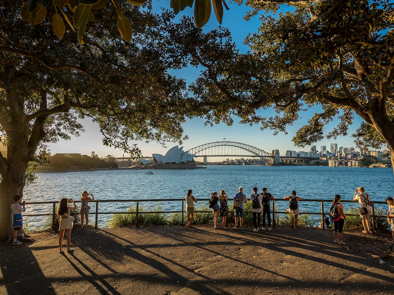 late afternoon sunlight at platform to view the Opera House and Harbour Bridge