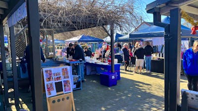people browsing market stalls