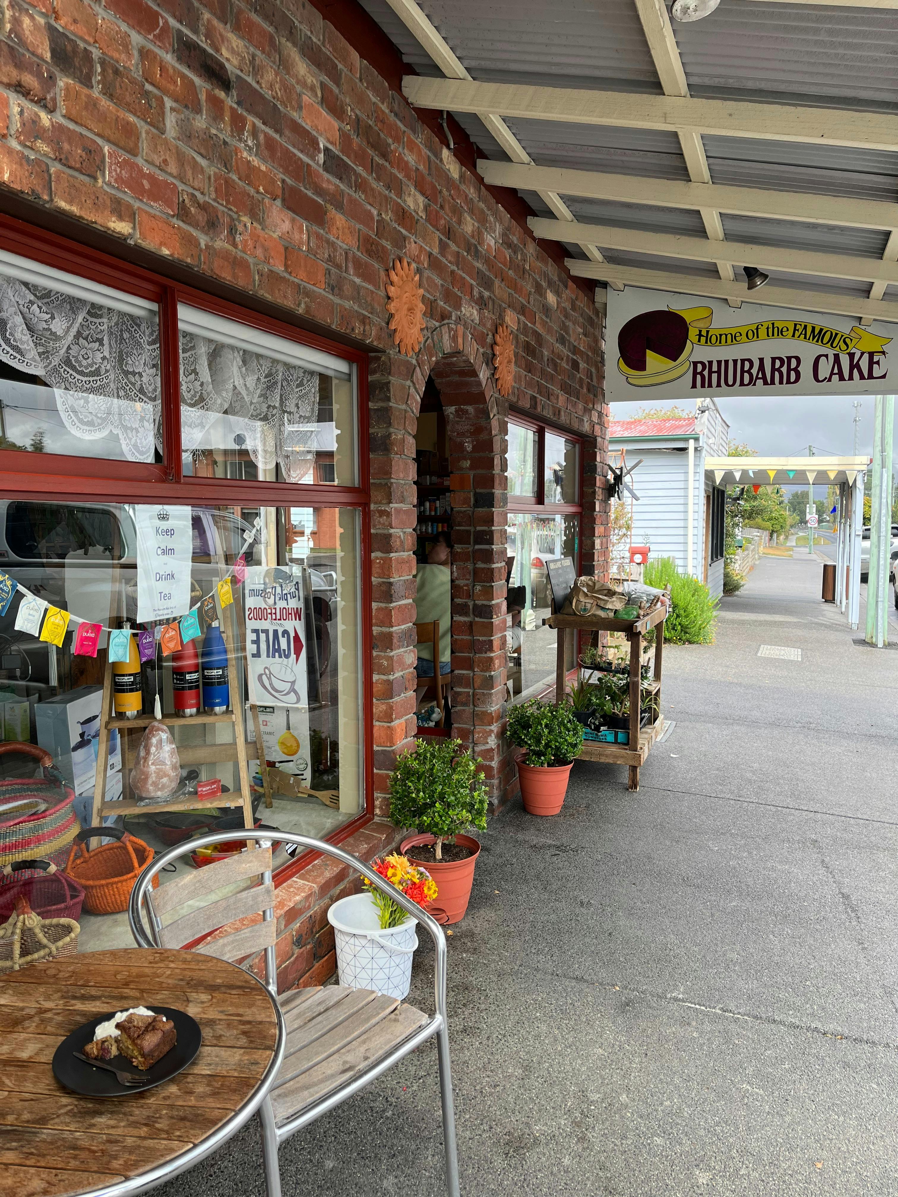 Outside the Purple Possum you can see a freshly served Rhubarb cake