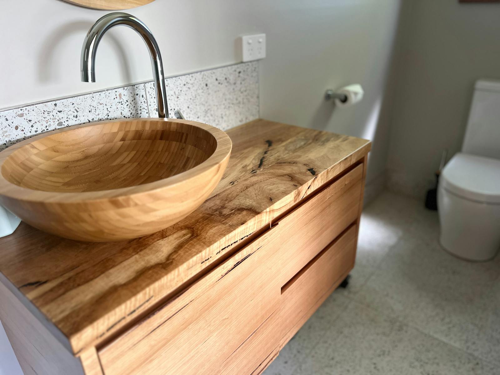 Bamboo basin, timber vanity cupboard, toilet