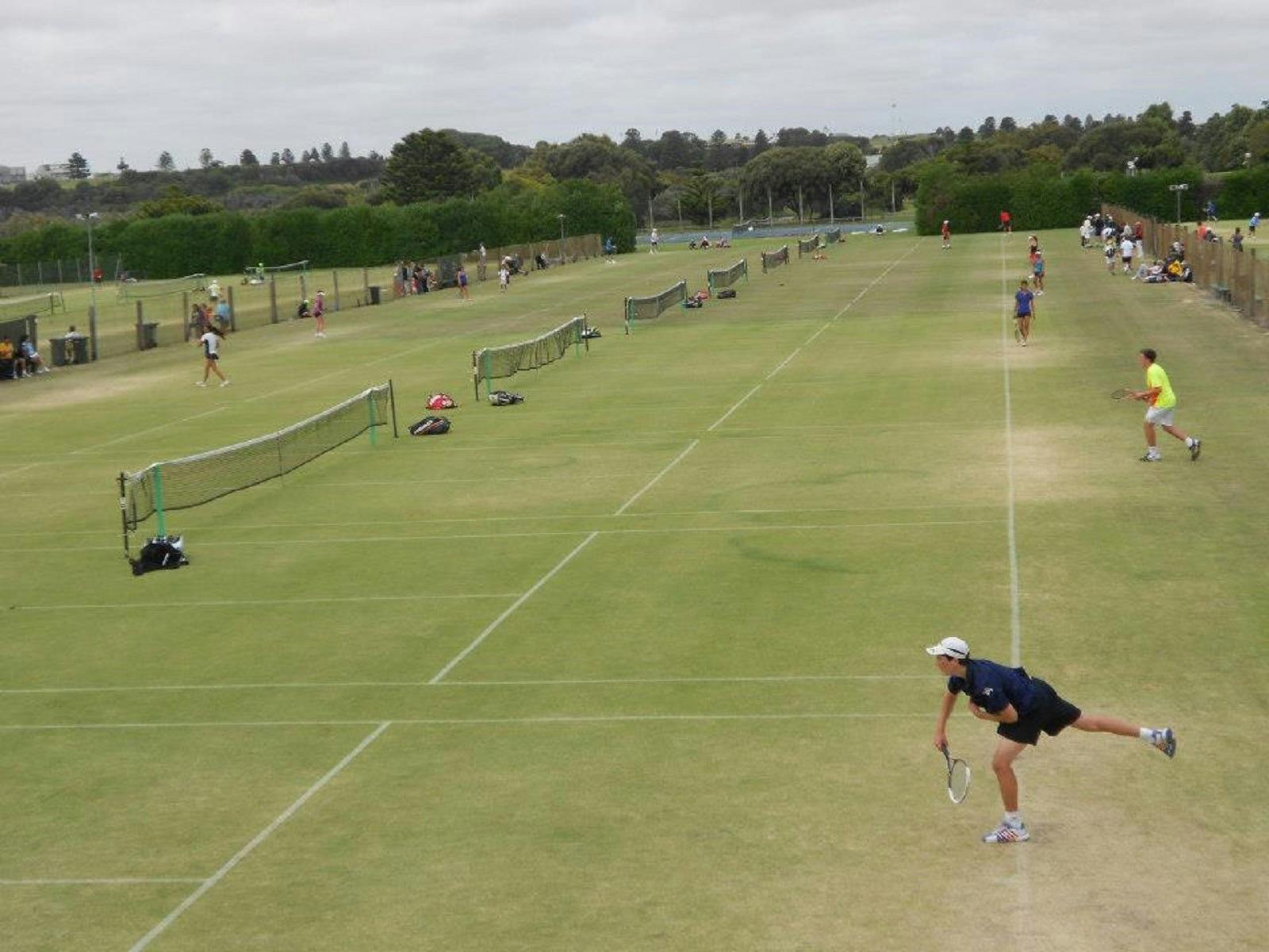 Playing tennis