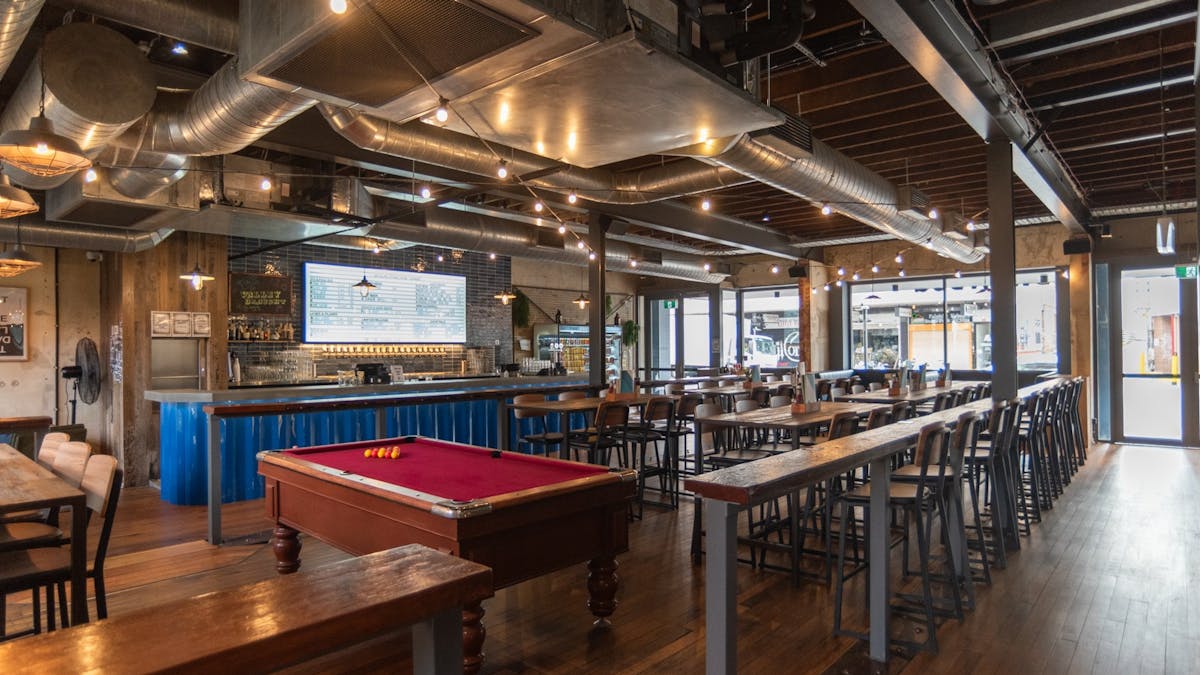 Brunswick St level seating, pool table and bar