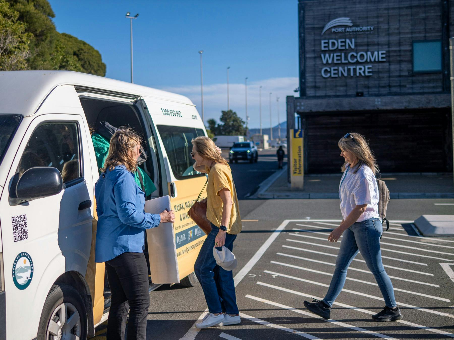 Guests boarding the mini bus for tour