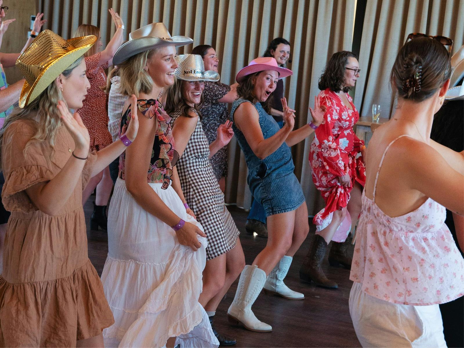 Guests dancing and enjoying at a Huskisson Hotel’s bottomless brunch