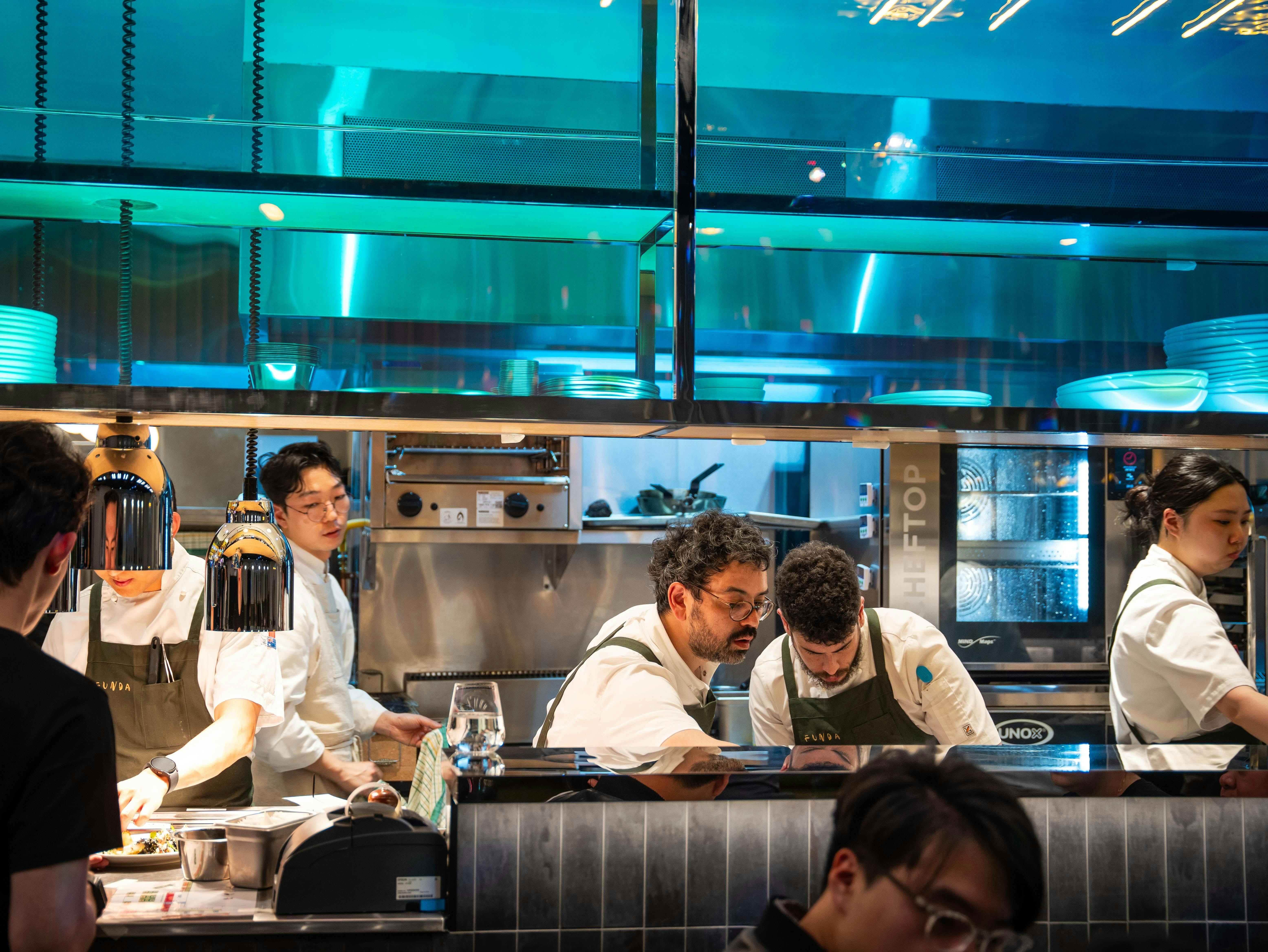 You can see our chefs working busily and energetically at this open kitchen while you enjoy yourself