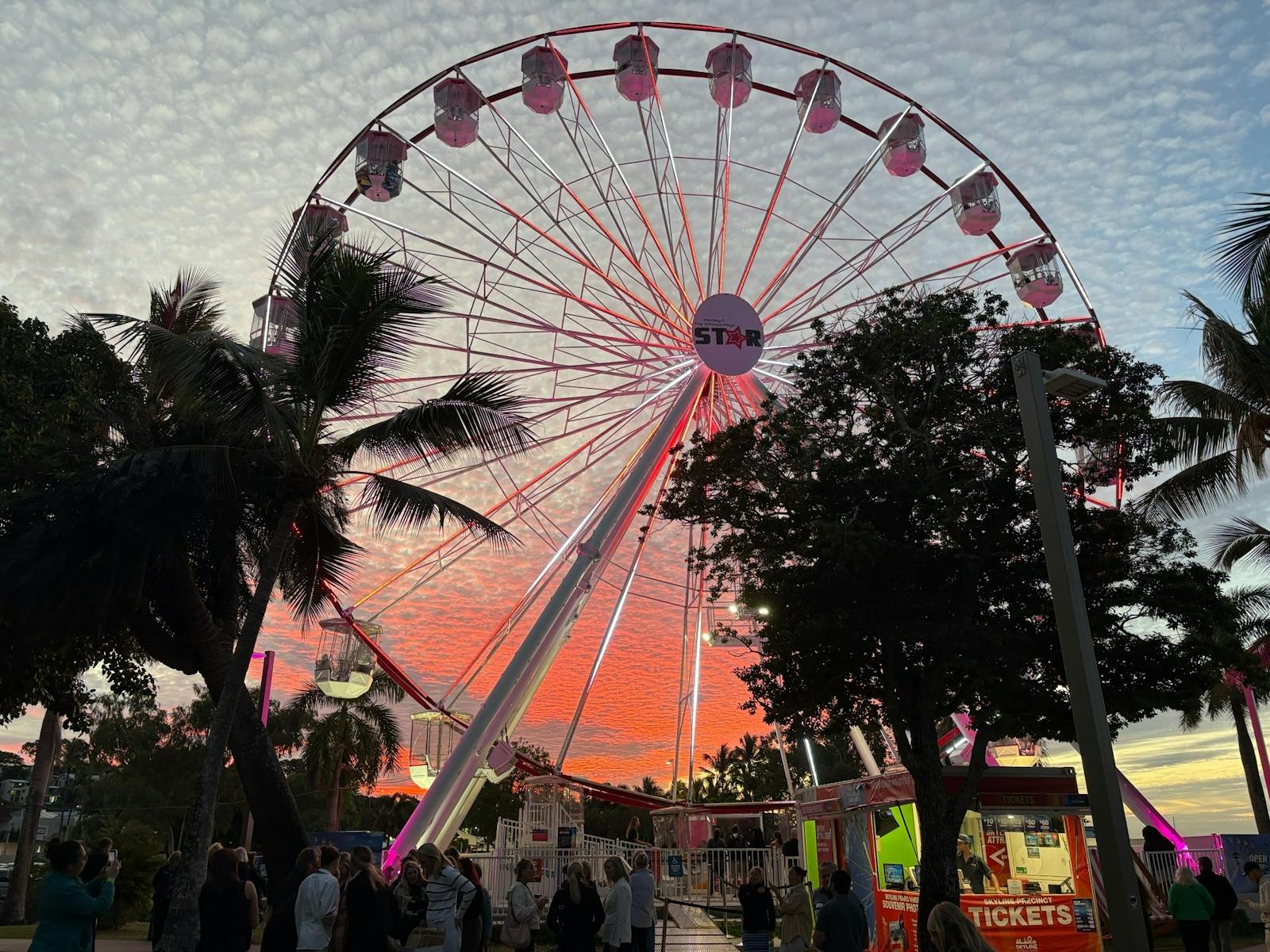 Ferris Wheel in front of the setting sun Ferris Wheel in front of the setting sun