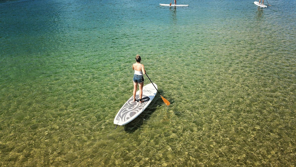 Stand up Paddle Boarding. All Coast Paddle Board Hire. Tallebudgera Creek. Gold Coast