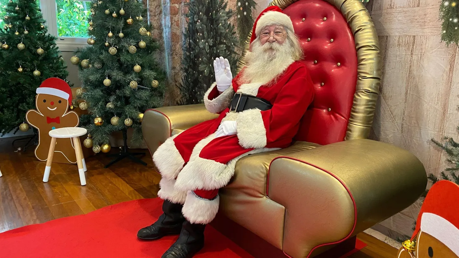 Santa sitting in Santa Land