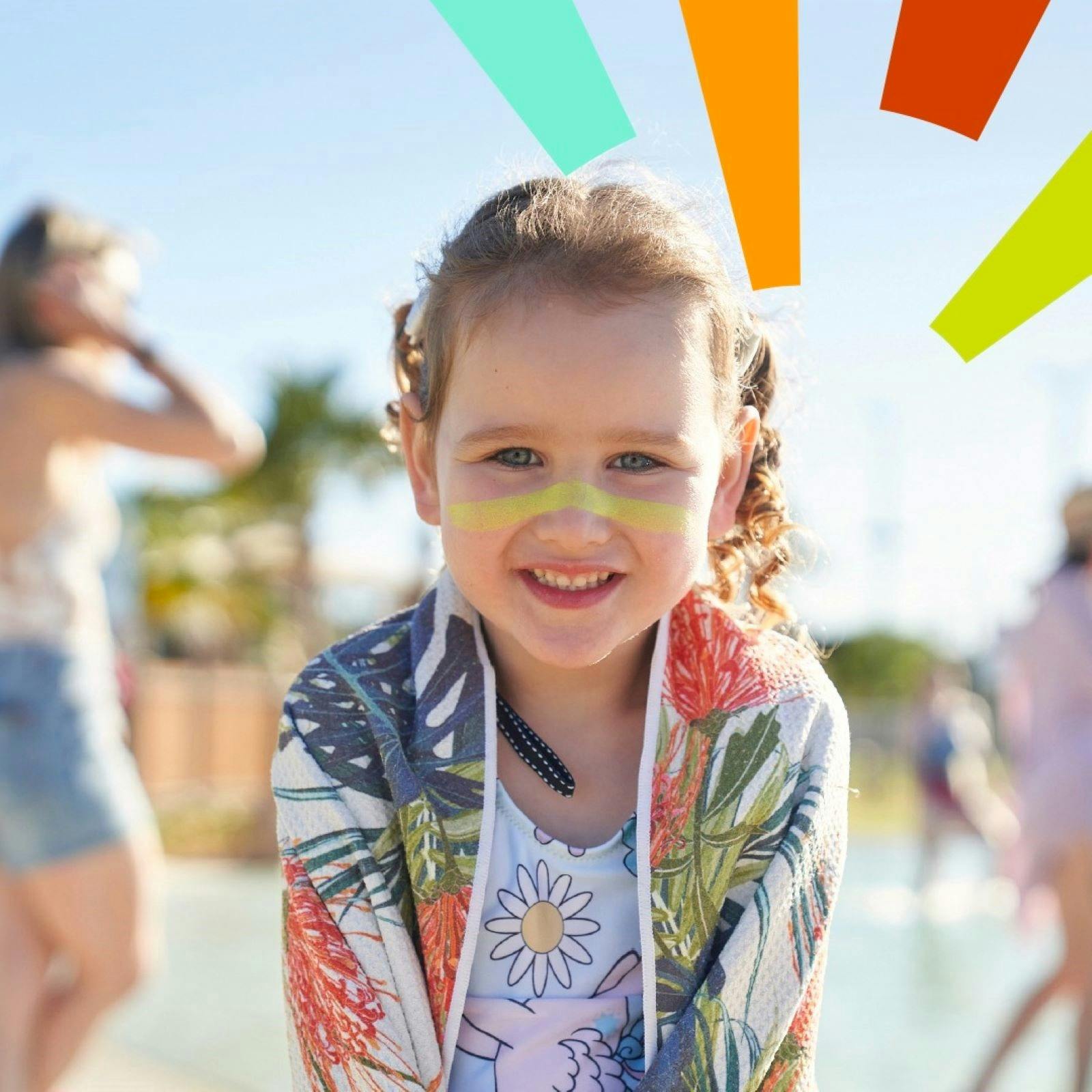 A young girl with zinc on her nose in summer clothes
