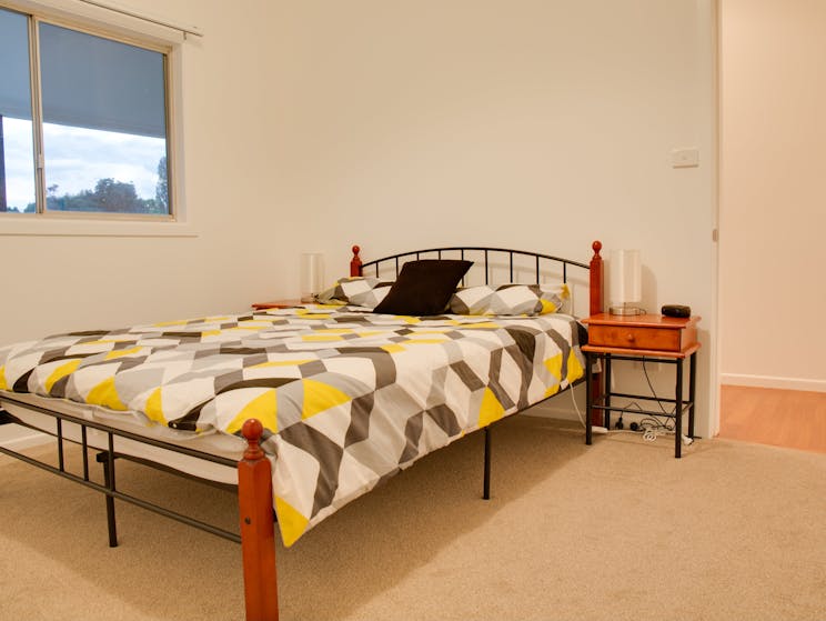 Main bedroom with ensuite and television