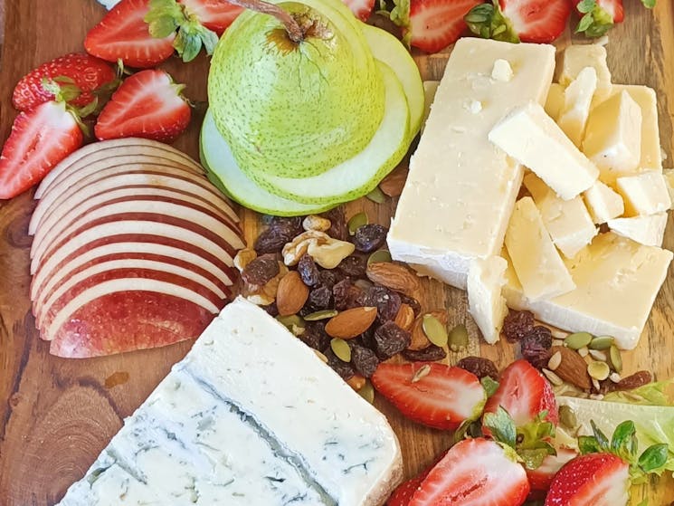 Enjoy a complimentary cheese buffet grazing board on the Tweed River sunset  Cruise