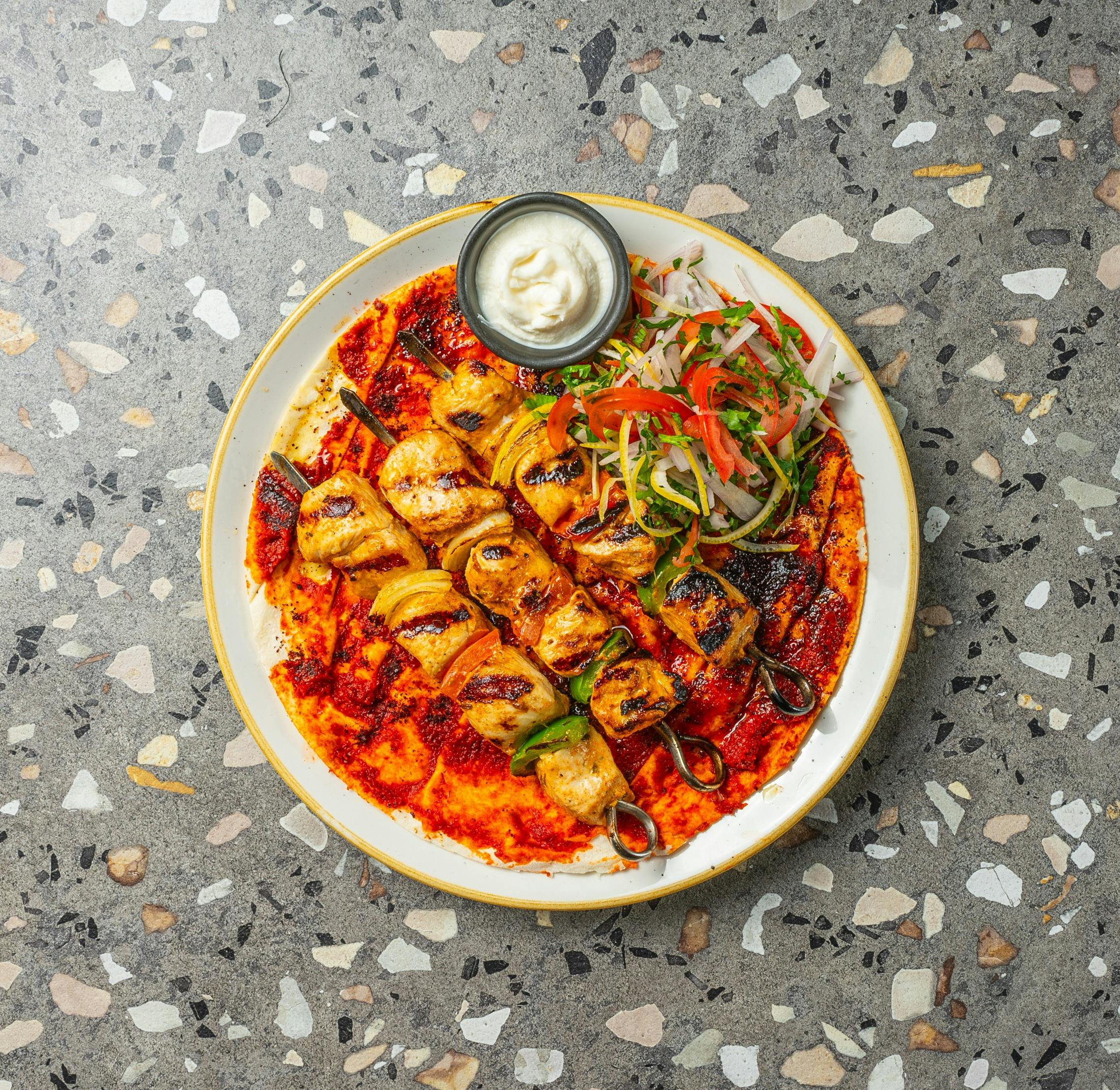 Shish Tawook marinated chicken breast skewers with chilli bread and garlic, menu at Azima Lebanese