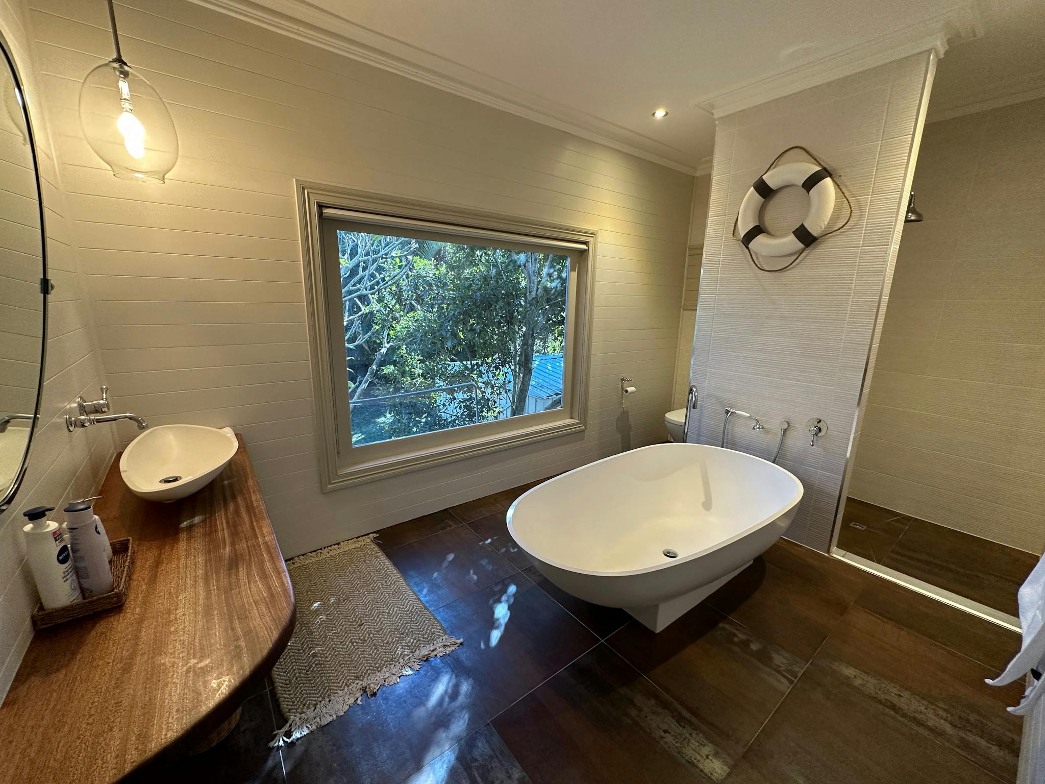 Bathroom with large avocado bathtub, shower and toilet Bathroom with large avocado bathtub, shower and toilet