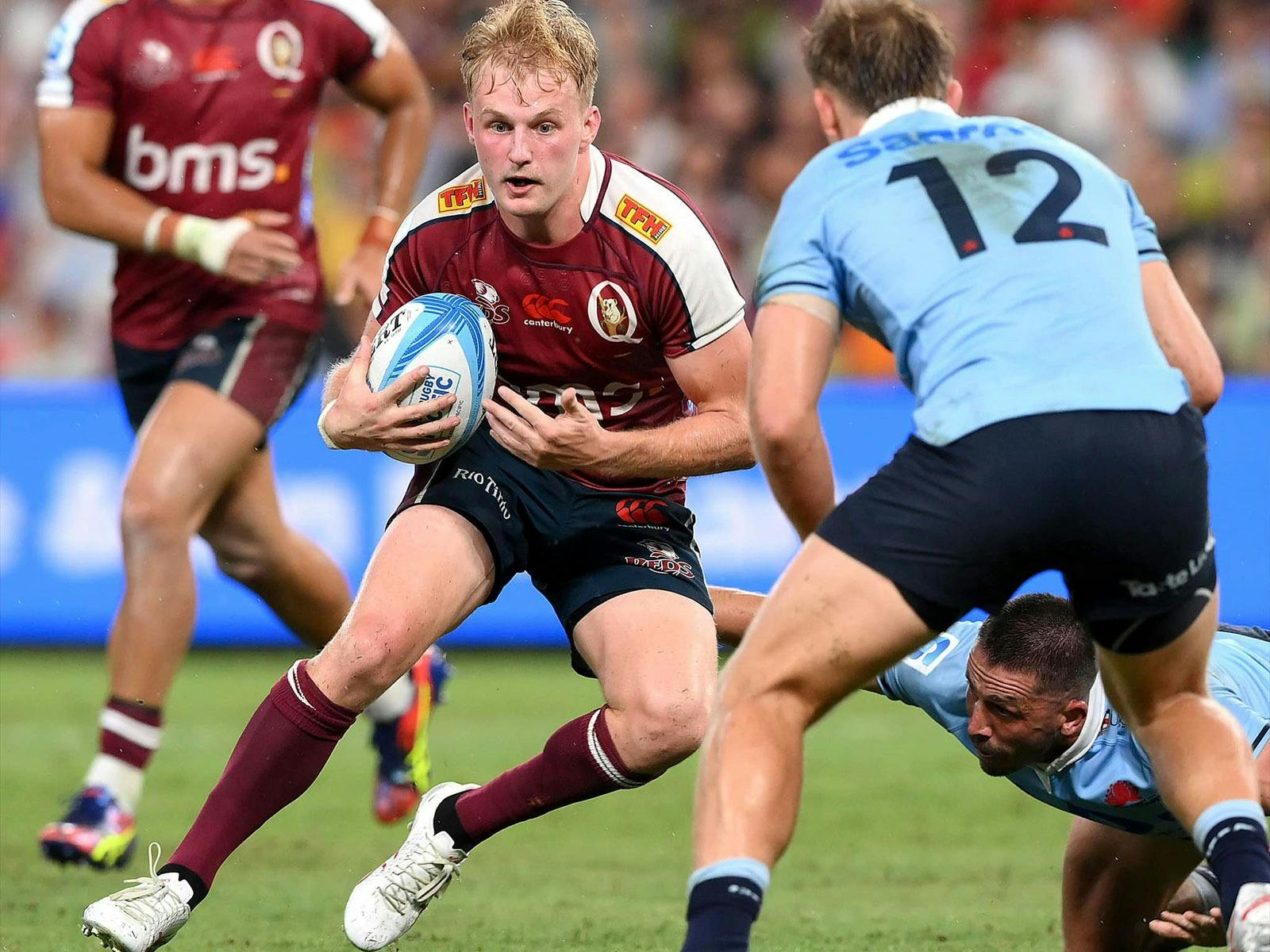 A Queensland Reds player stepping