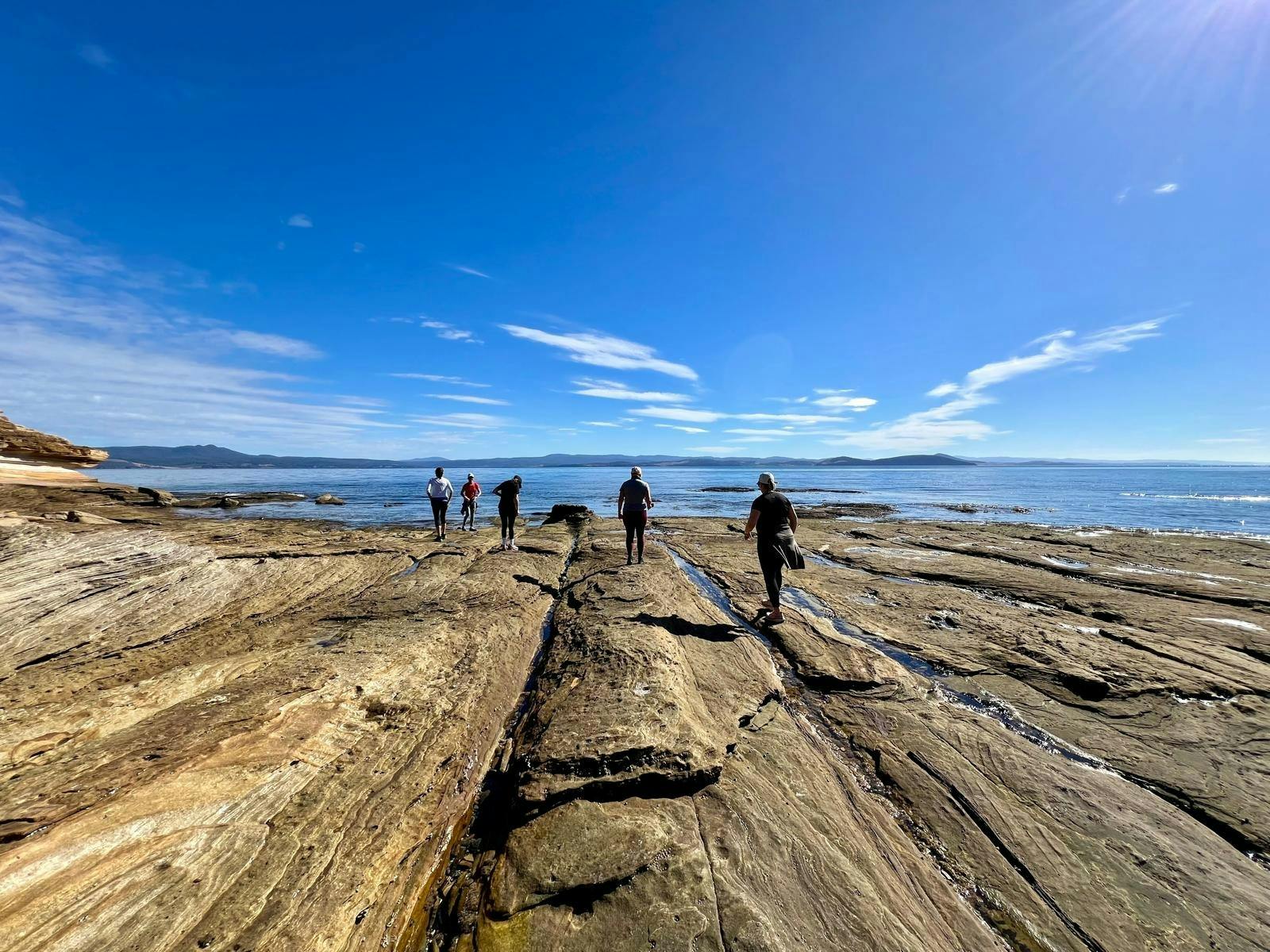 Walking near the painted cliffs on MAria Island