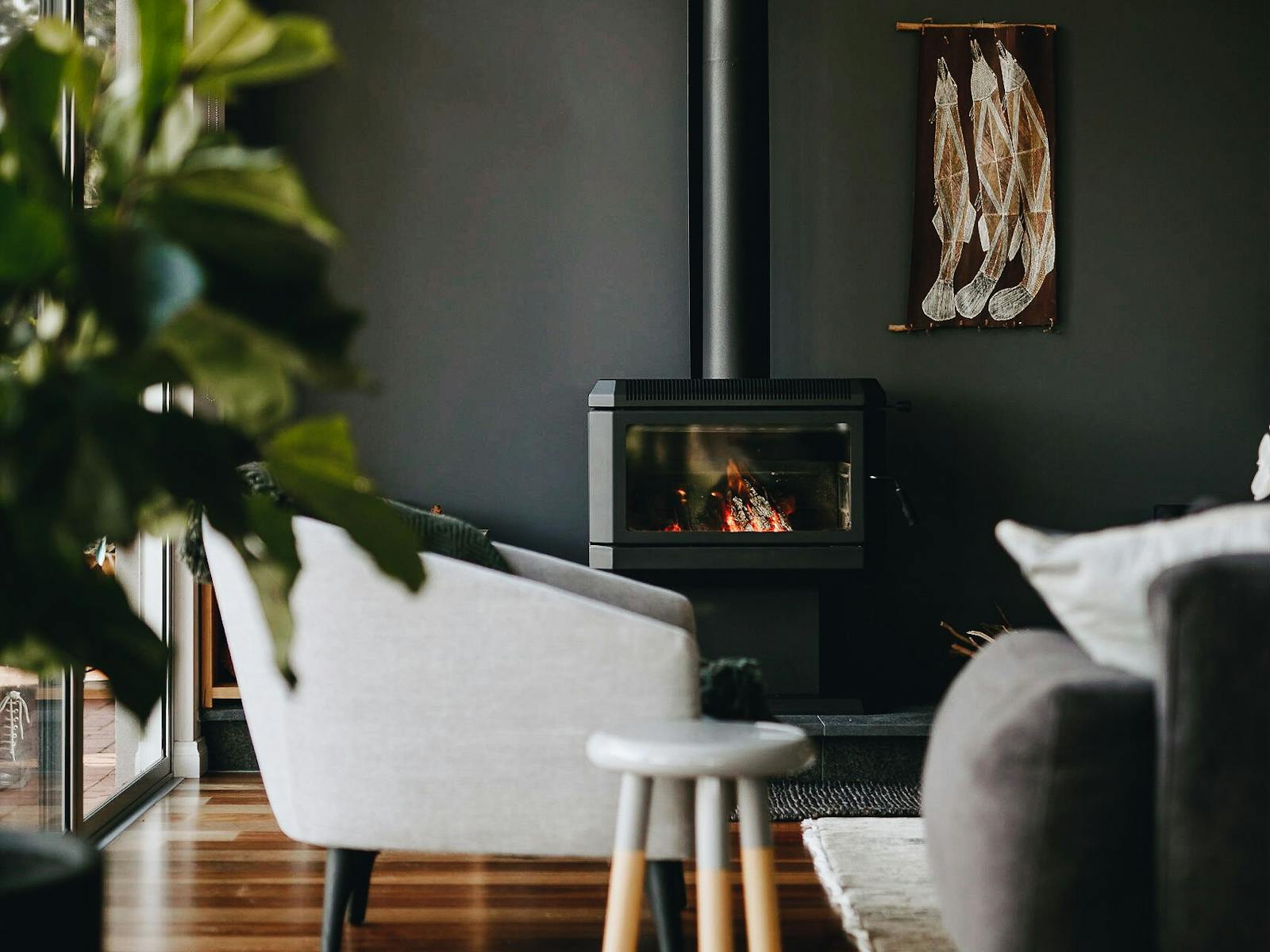 Cosy living room with burning fireplace