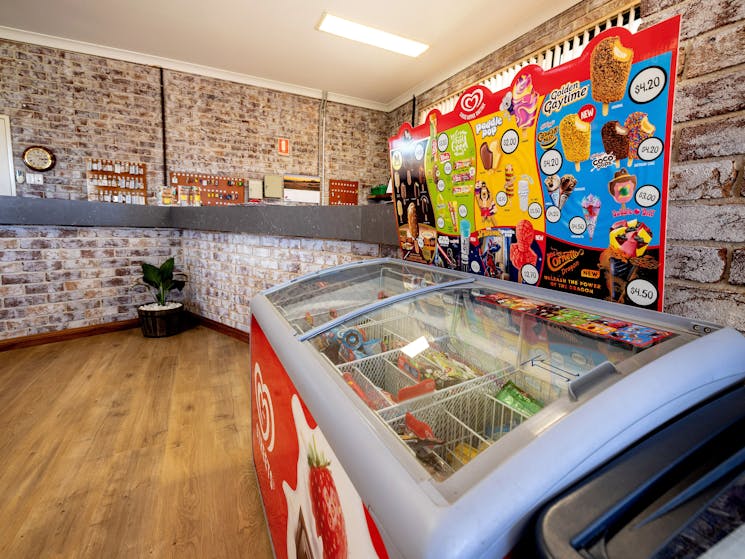 Image of reception, with a display fridge with Ice cream