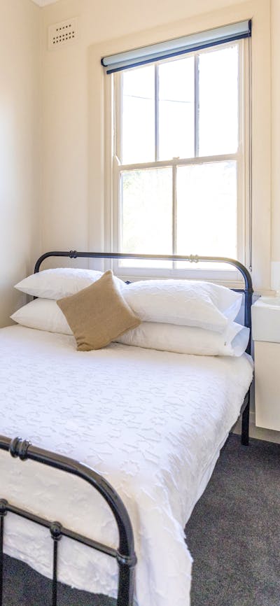 Double Room with bed and sink.