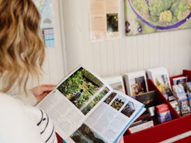 person holding guide