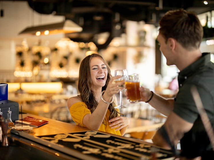 Couple enjoying drinks at ALEXandCo., Parramatta