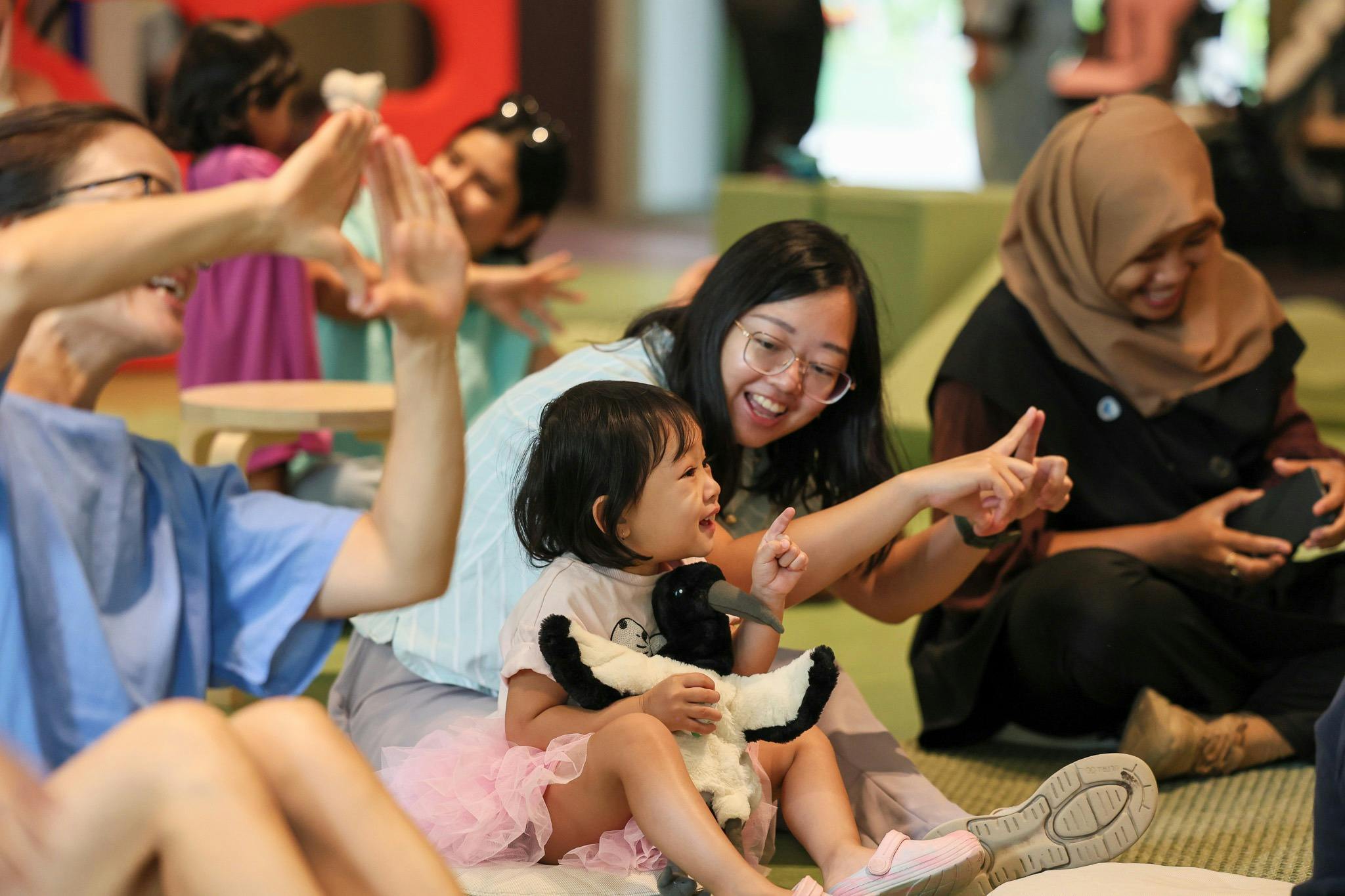Children enjoy Songs and Stories time at The Corner