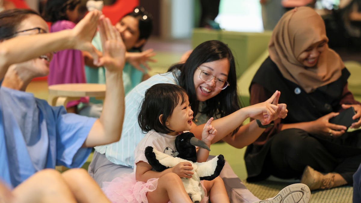 Children enjoy Songs and Stories time at The Corner