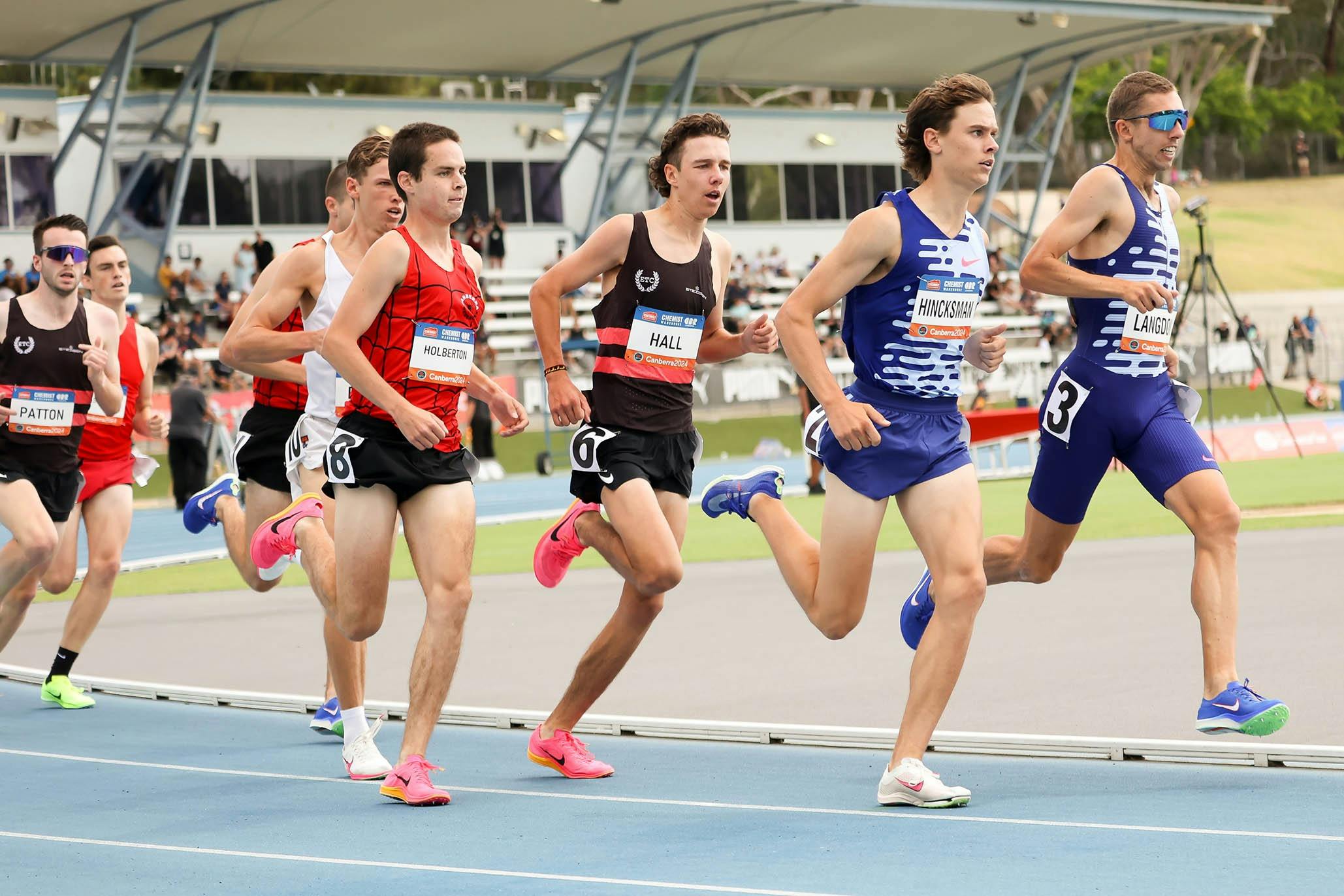 middle distance runners competing mid race