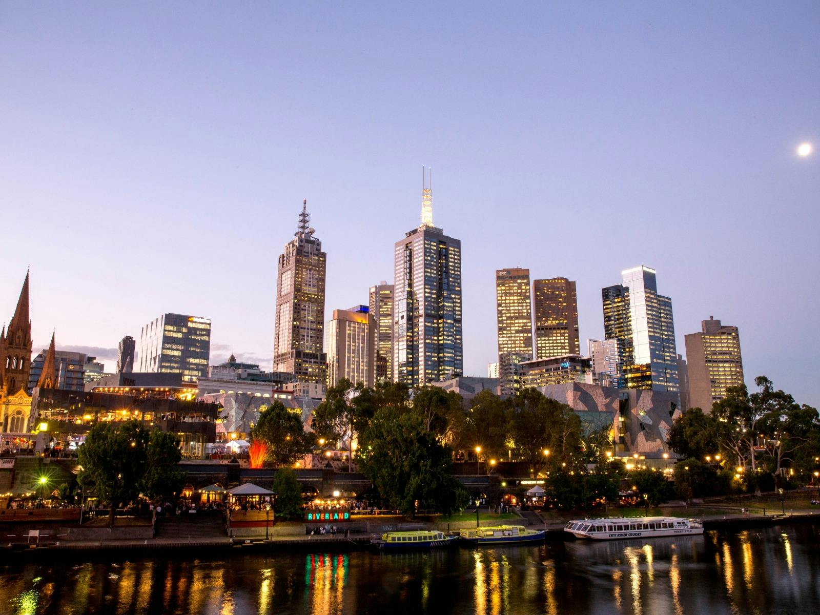 Riverland Bar at dusk with city skyline