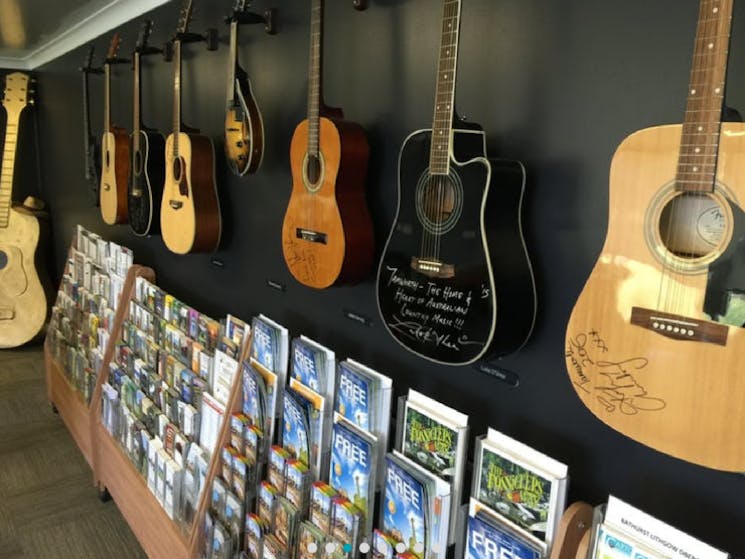 Image of guitars and information flyers available at the Big Golden Guitar Visitor Centre