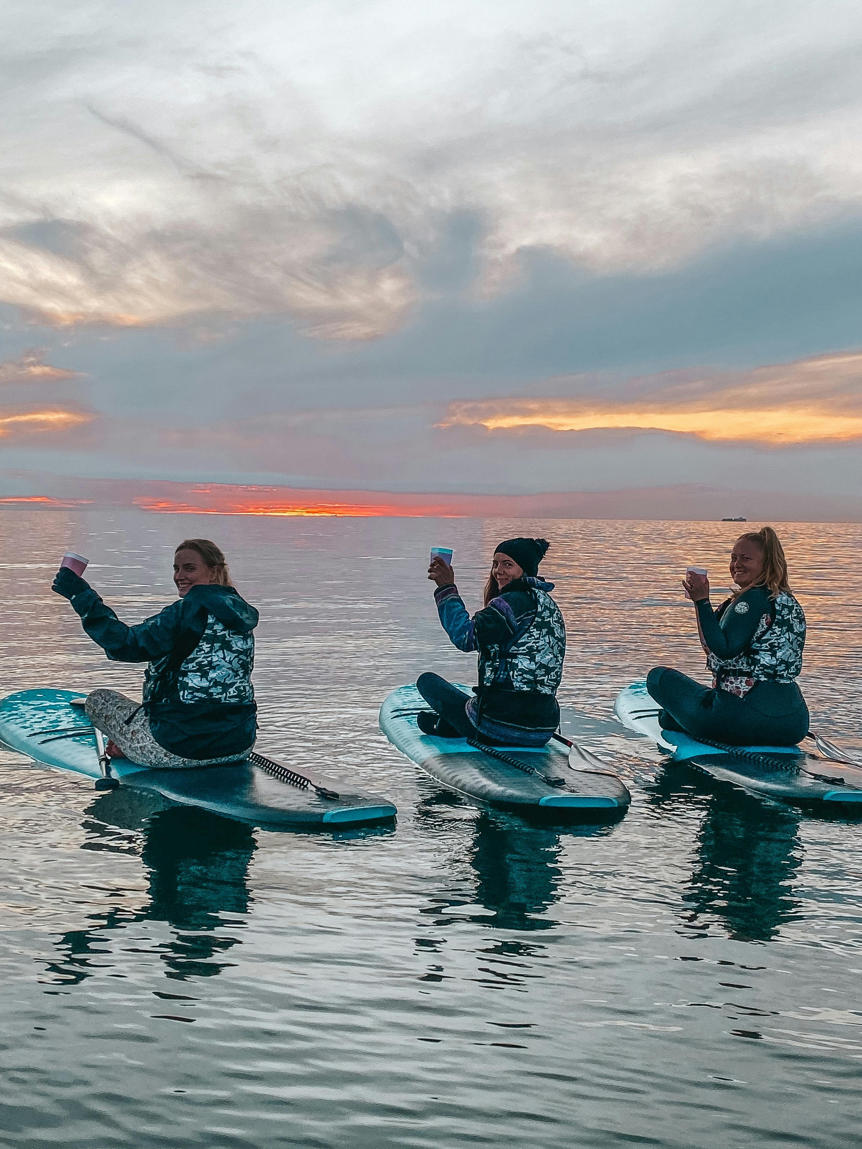 sunset stand up paddle boarding women Adelaide south australia