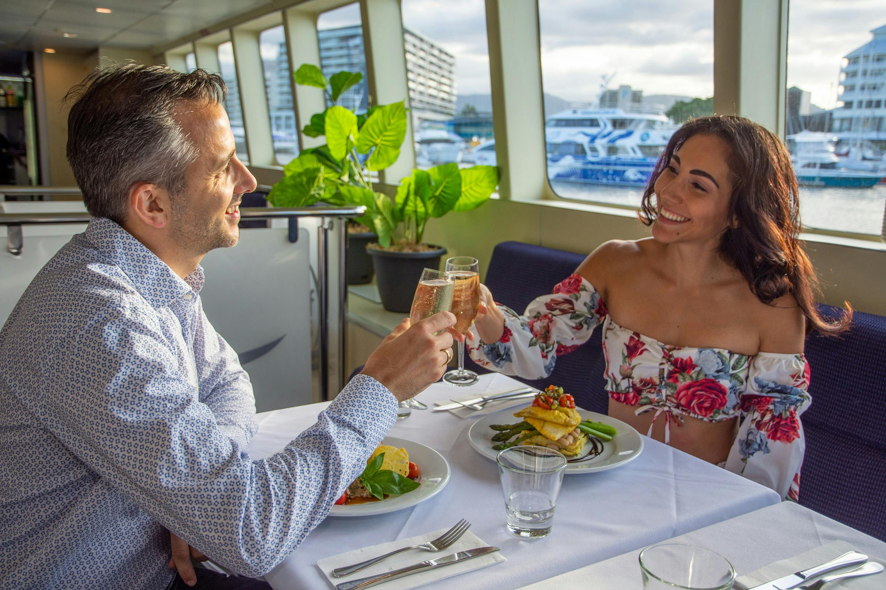 Couple enjoying a Spirit of Cairns dinner cruise