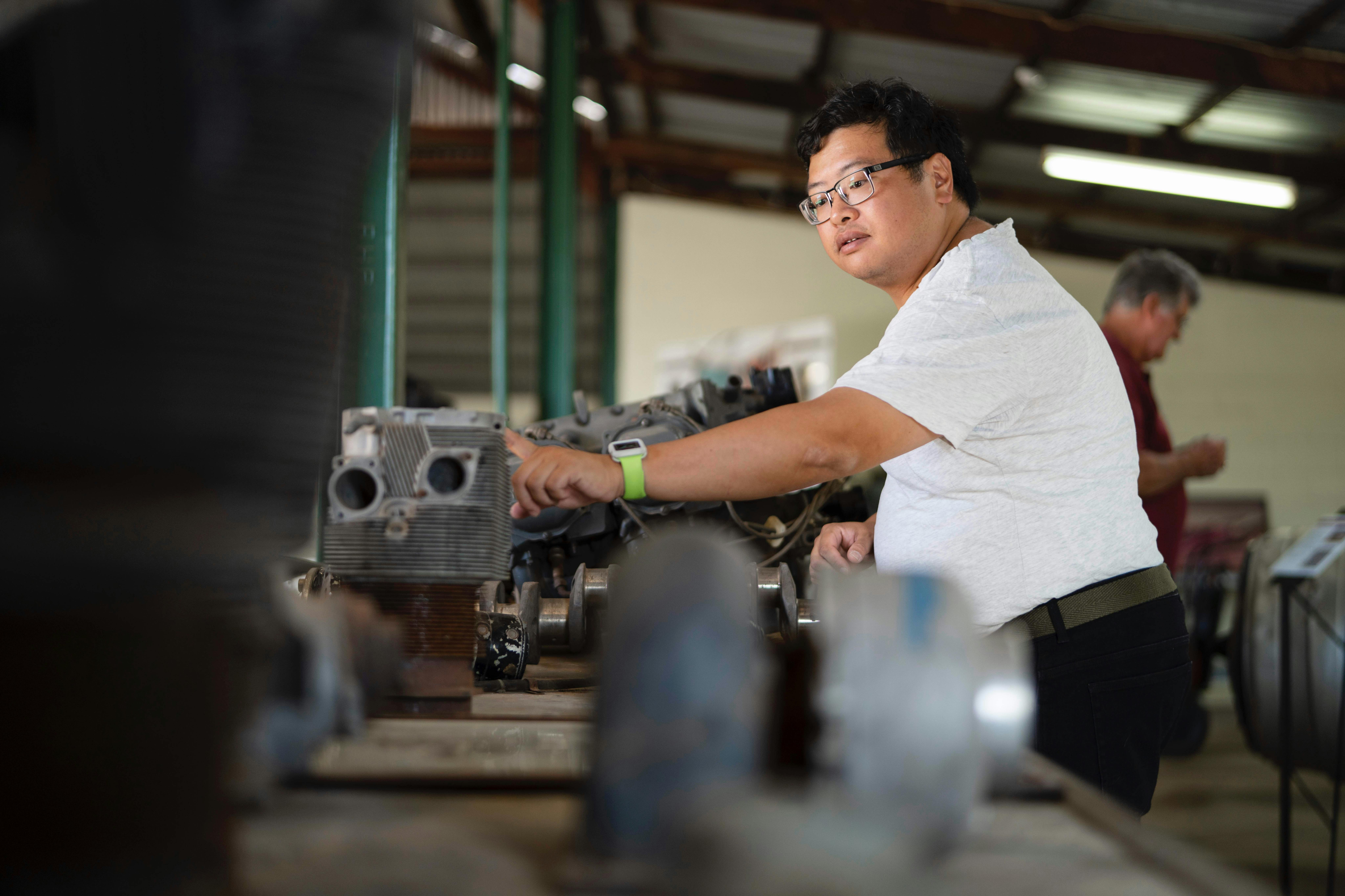 Mechanical parts and equipment to make aviation tragics' hearts fly - displays in original workshop.
