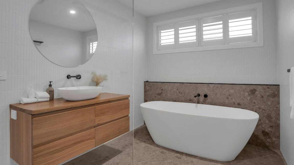 Main bathroom with bathtub and walk in shower
