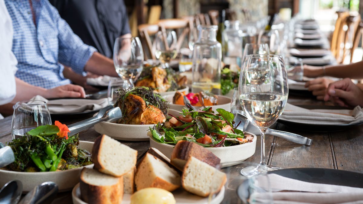 Long table food spread at The Barn
