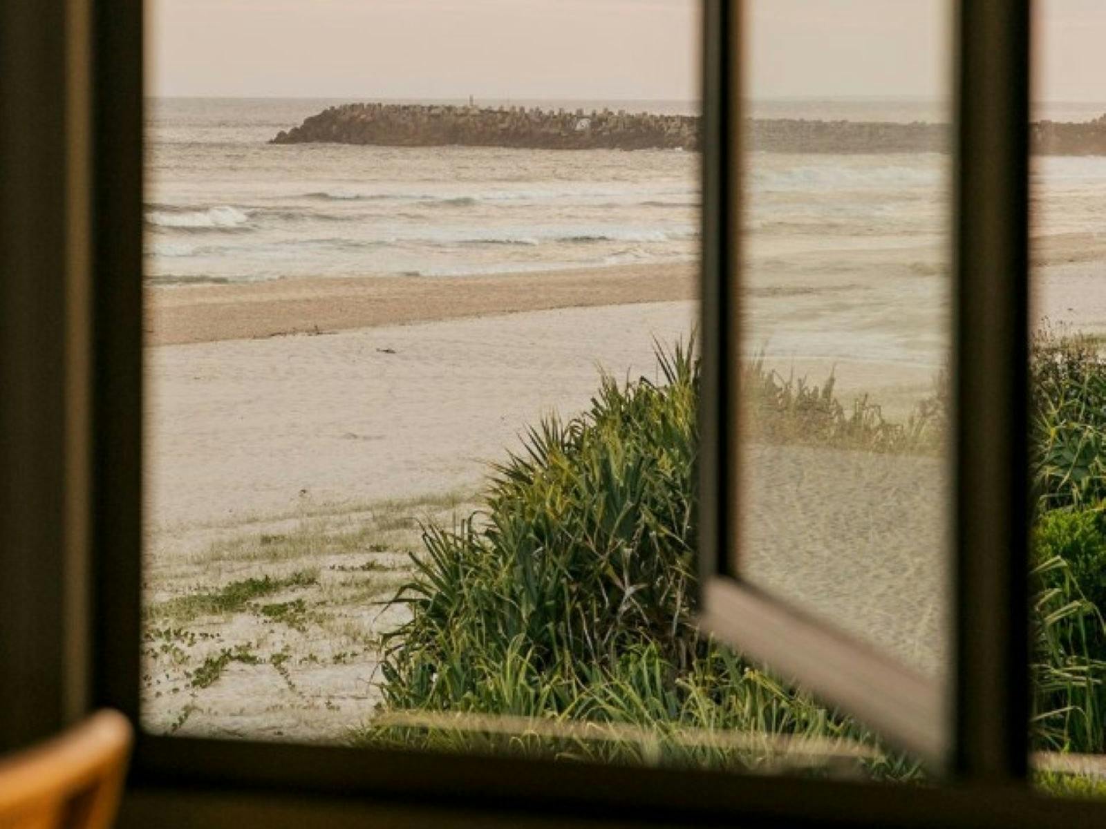 View looking out the window over the beach towards North Wall