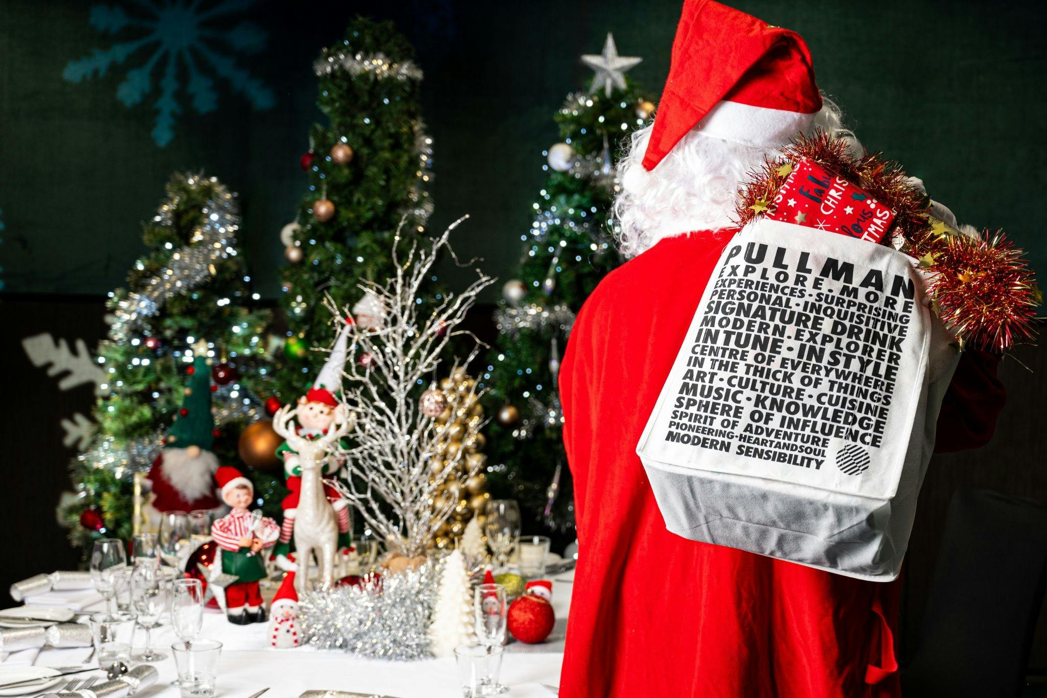Santa with a Pullman Brisbane bag