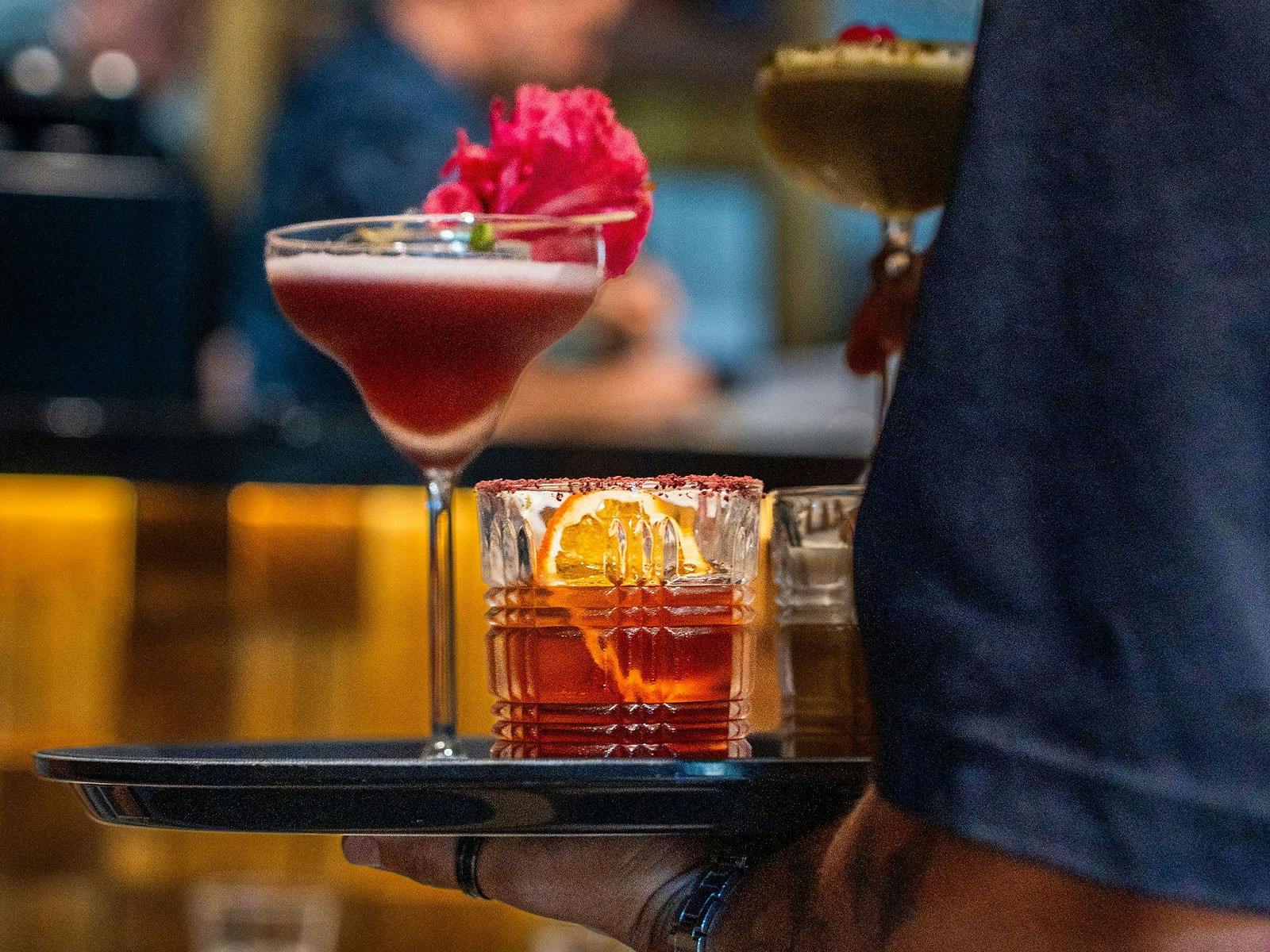 KOI Bar & Restaurant cocktails, including Shiso Sour, Davidson plum negroni and matcha sour.