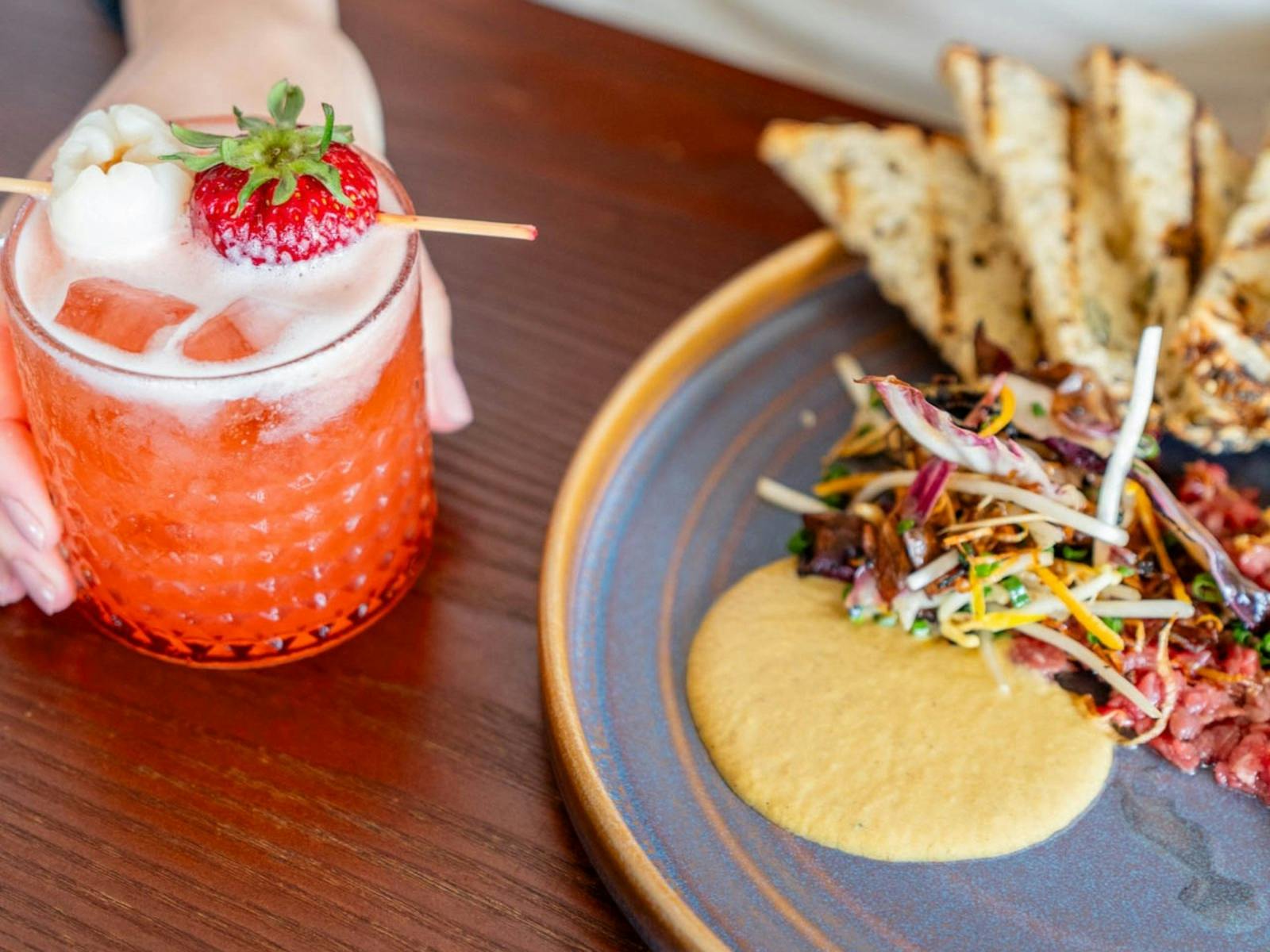 a delicious meal and orange cocktail at Kelp