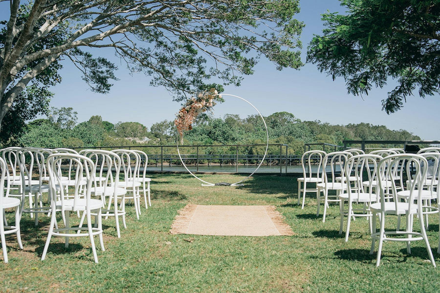 Wedding ceremony in the adjoining park overlooking the river.