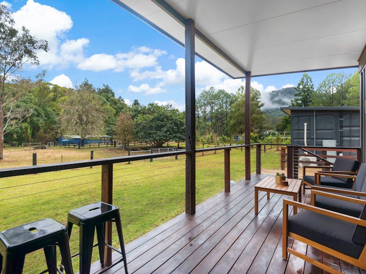 The hardwood deck on each cottage is a beautful spot to relax and take in the views