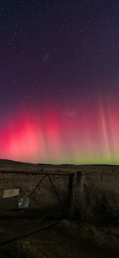 This photo shows the yellow and red of the Aurora Australis that occurred in the Canberra area.