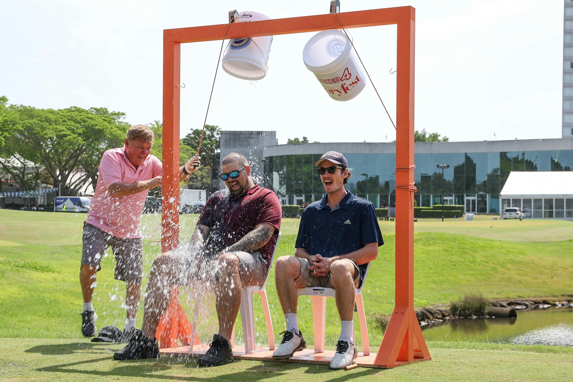 Charity water bucket event raising money for children's literacy