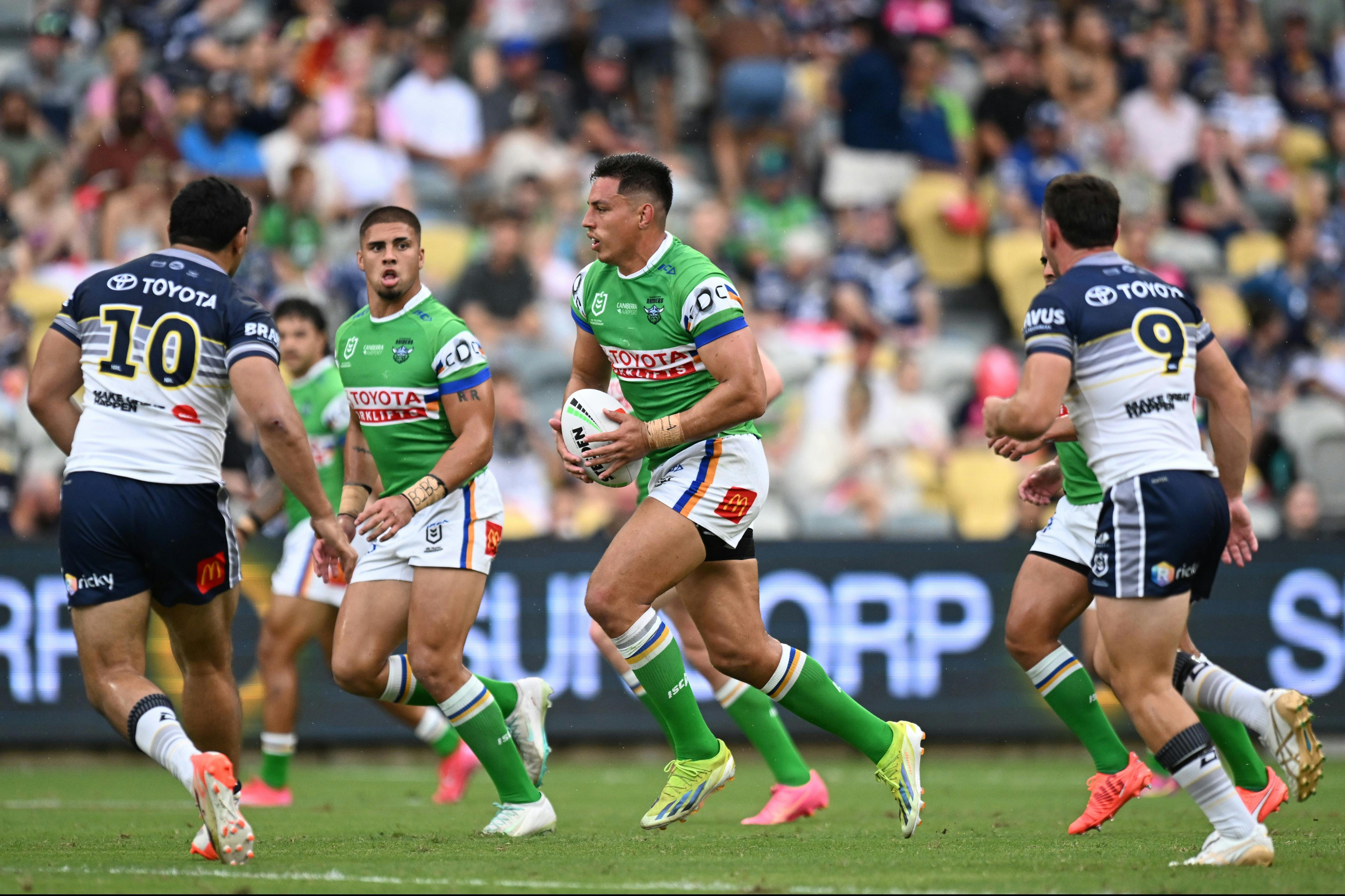 Canberra Raiders player Joseph Tapine running the ball.