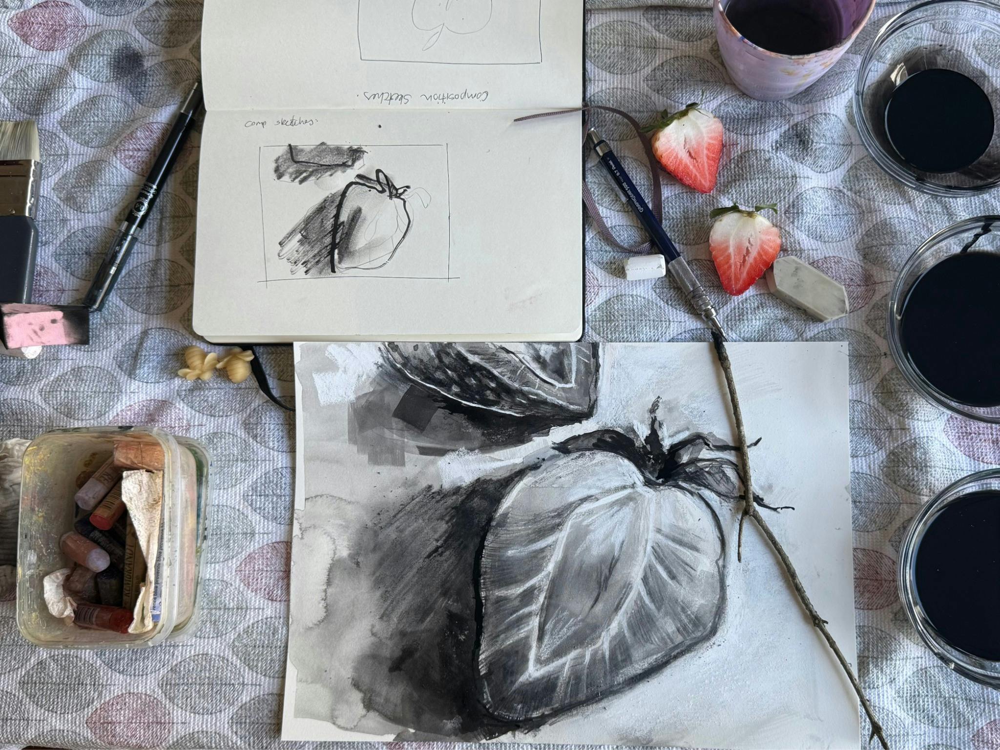 illustration of a strawberry with papers, inks and  fruit