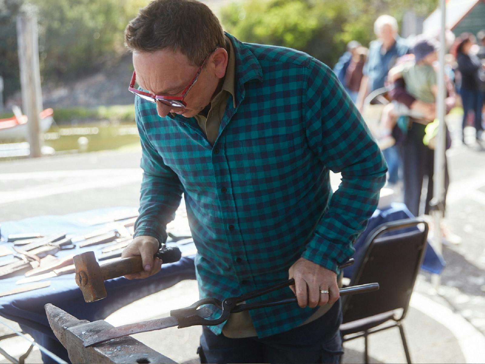craftsman working on a knife