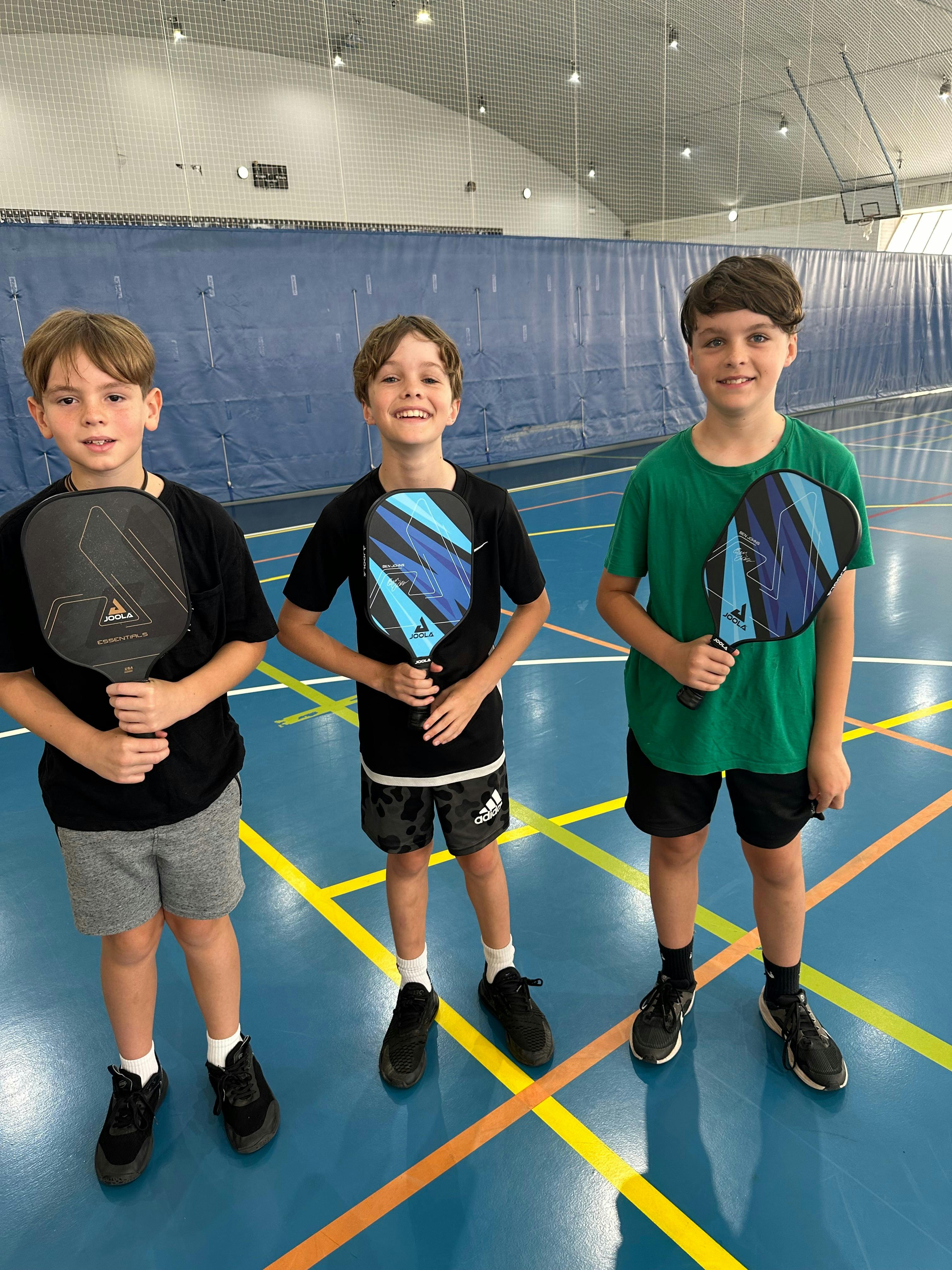 Kids enjoying Pickleball