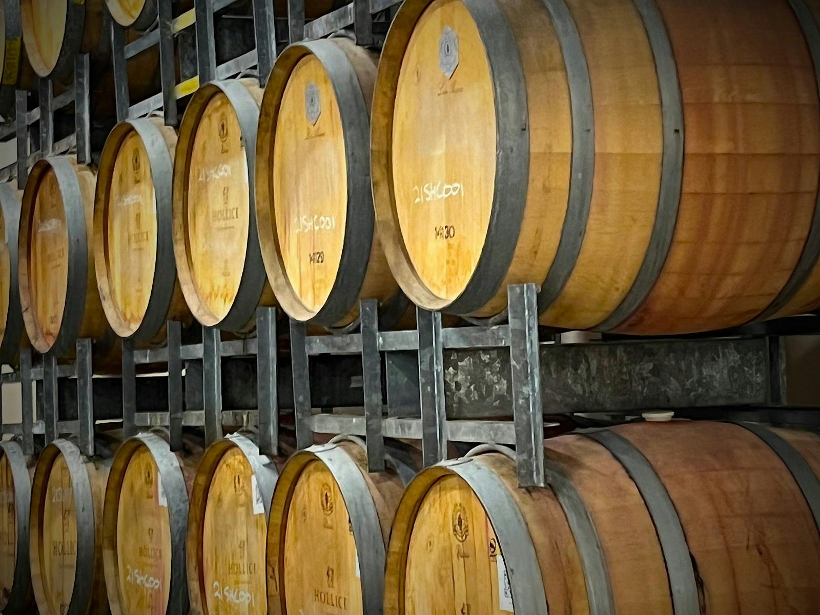 Wine is sored in Wine Barrell in the cool of the Cellars