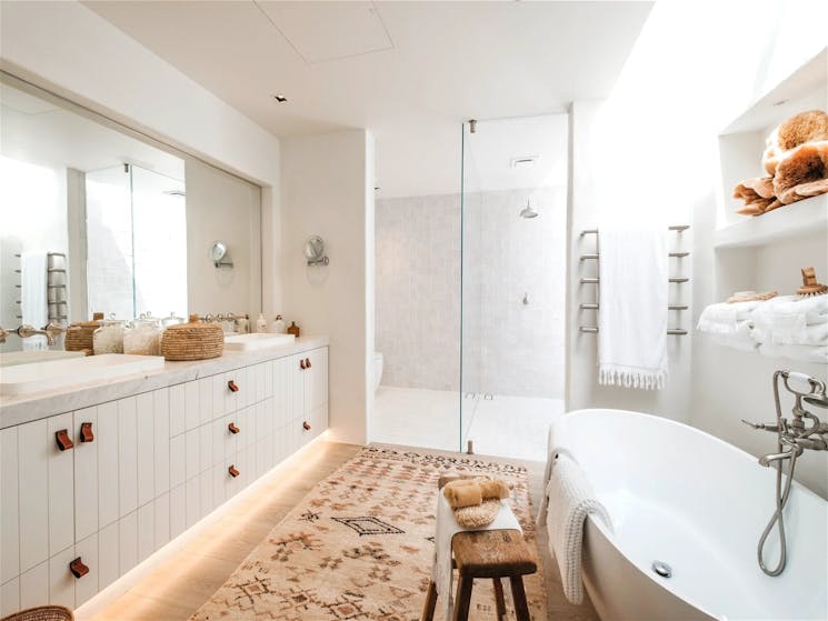 Luxurious bathroom featuring  a bathtub