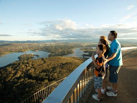 Family looking over Canberra from the Telstra Tower lookout